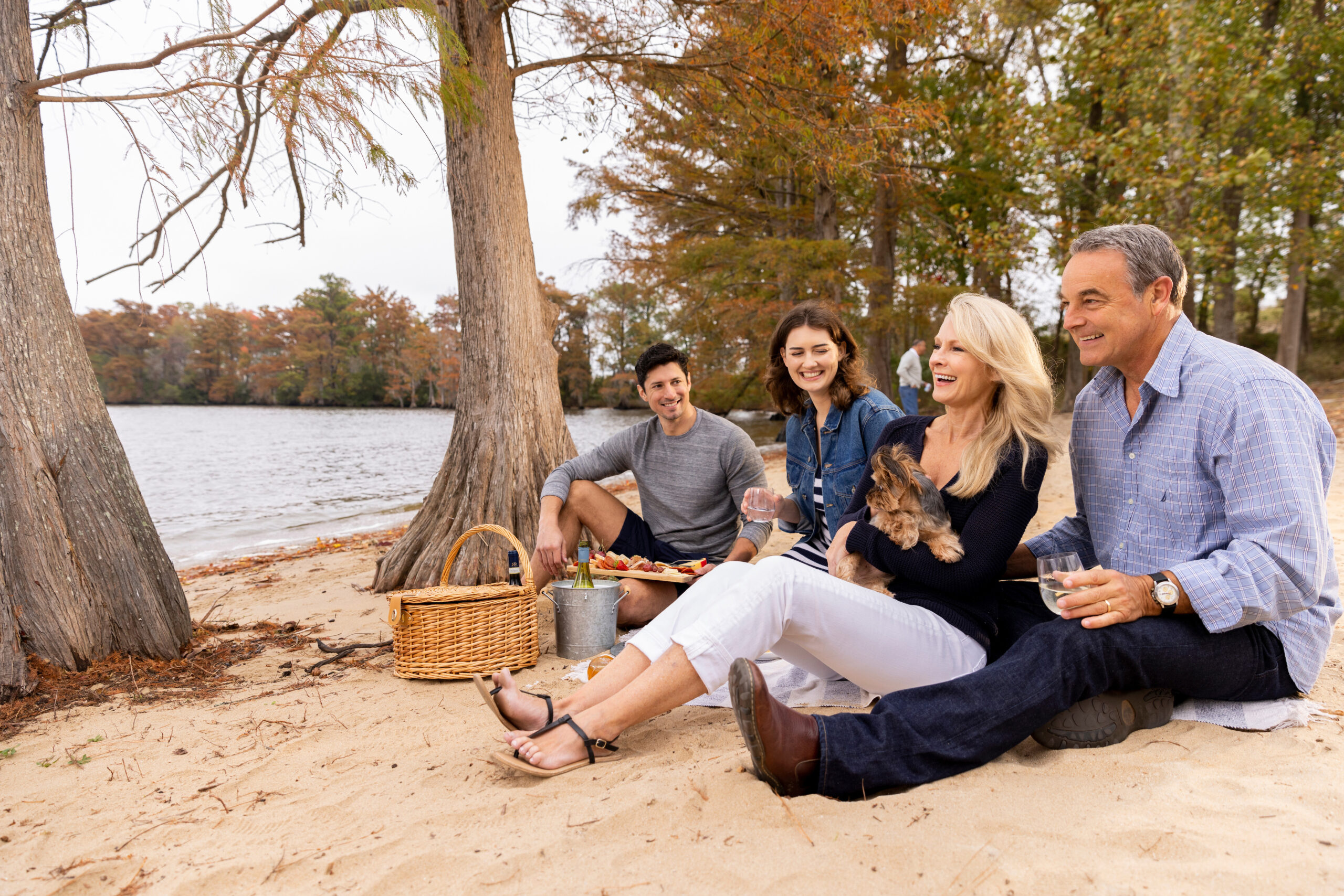 Family enjoying a picnic on the beach