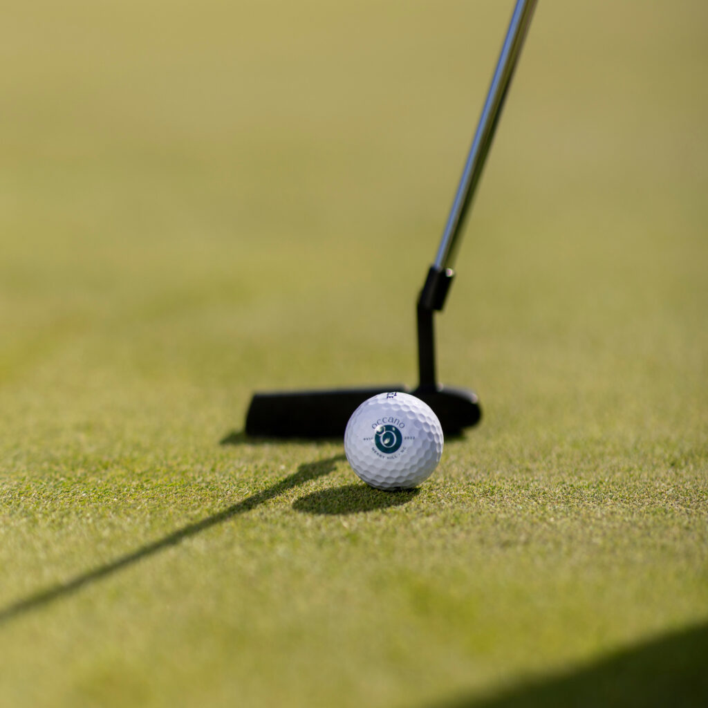 Occano golf ball and putter