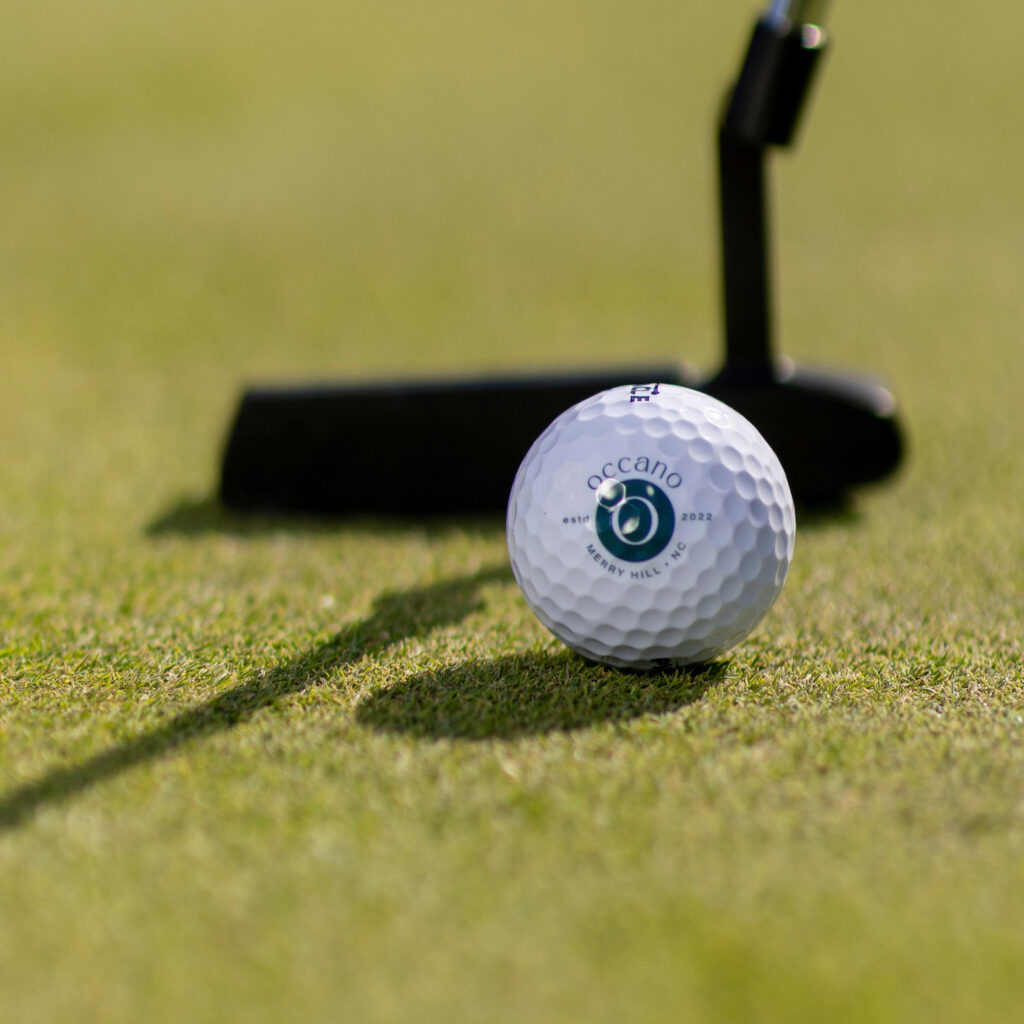 Occano golf ball and putter
